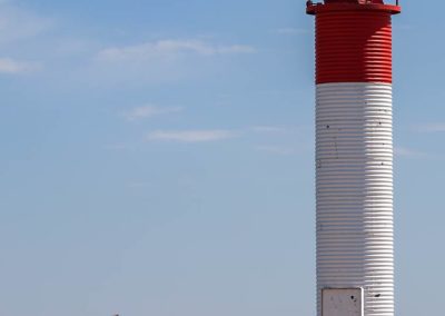 Cyclist by the Lighthouse