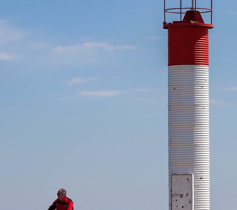 Cyclist by the Lighthouse