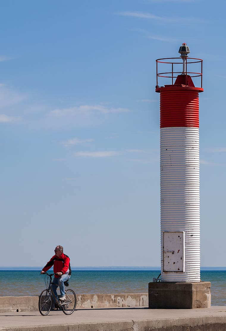 Cyclist by the Lighthouse